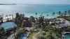 The lawsuits say Nygard has been trying to sell his home in The Bahamas on Nygard Cay for around $59 million. (CBC News)