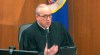 In this image from video, Hennepin County Judge Peter Cahill reads instructions to the jury before closing arguments, Monday, April 19, 2021, in the trial of former Minneapolis police officer Derek Chauvin at the Hennepin County Courthouse in Minneapolis. Chauvin is charged in the May 25, 2020 death of George Floyd. (Court TV via AP, Pool)