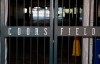 The main gate of Coors Field, home of the Major League Baseball team the Colorado Rockies, is locked early Tuesday, June 23, 2020, in Denver. The league is waiting for the players' union to respond Tuesday to whether it will agree to health protocols for a 60-game regular-season slate and if players will report for training camp by July 1. (AP Photo/David Zalubowski)