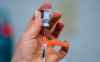 A syringe is loaded with COVID-19 vaccine (Jonathan Hayward / The Canadian Press files)