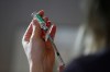 CP
Dr. Joss Reimer, medical lead, Manitoba Vaccine Implementation Task Force draws a dose of the AstraZeneca COVID-19 vaccine at a clinic in Winnipeg, Friday, March 19, 2021. (John Woods / The Canadian Press Files)