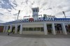 Construction workers walk past the main entrance to the TD Ballpark, the Florida home of Toronto Blue Jays, as they get the stadium ready in Dunedin, Fla., Sunday, Feb. 16, 2020. Blue Jays fans visiting Toronto's spring training stadium in Florida will be treated to an upgraded game-watching experience this season, and perhaps a lesson in community history, thanks to a hefty renovation at the ballpark that began early last year. THE CANADIAN PRESS/Steve Nesius