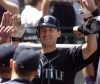 Seattle Mariners' John Olerud is congratulated as he enters the dougout after hitting his first home run against the Anaheim Angels in the fourth inning in Seattle on June 29, 2000. Former Toronto Blue Jays first baseman and two-time World Series champion John Olerud headlines the four-man class that will be inducted into the Canadian Baseball Hall of Fame this summer. Olerud, along with New Westminster, B.C., native Justin Morneau, former Blue Jays pitcher Duane Ward and Montreal sportscaster Jacques Doucet will be enshrined in a ceremony in St. Marys, Ont., on June 20. THE CANADIAN PRESS/AP, John Froschauer