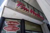 A Tim Hortons coffee shop is shown in downtown Toronto on Wednesday, June 29, 2016. Tim Hortons says it will stop accepting reusable cups brought in by customers amid concerns about the novel coronavirus outbreak. THE CANADIAN PRESS/Eduardo Lima