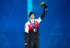 Canada's bronze medallist Denny Morrison stands on the podium during the medal ceremony for the men's 1,500m speed skating competition at the Sochi Winter Olympics on February 16, 2014 in Sochi, Russia. Denny Morrison leaves speedskating a king of comebacks and the beneficiary of a teammate's generosity. Winner of Olympic gold and silver medals in team pursuit and a silver and a bronze in individual distances, the 34-year-old from Fort St. John, B.C., is retiring and will be honoured Saturday during a World Cup in Calgary. THE CANADIAN PRESS/Adrian Wyld