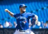 Toronto Blue Jays starting pitcher Sean Reid-Foley (54) works against the Texas Rangers during first inning American League MLB baseball action in Toronto on Wednesday, August 14, 2019. The Toronto Blue Jays have optioned left-hander Anthony Kay and right-hander Sean Reid-Foley to triple-A Buffalo. THE CANADIAN PRESS/Nathan Denette