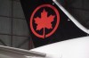 The Air Canada is seen on an aircraft at a hangar at Toronto Pearson International Airport in Mississauga, Ont., February 9, 2017. Air Canada is cancelling all flights to Italy starting Wednesday, following the lead of European carriers that have halted service to a country now under nationwide lockdown to contain the new coronavirus. THE CANADIAN PRESS/Mark Blinch