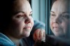 Jessica Reid poses in her Winnipeg apartment Friday, December 20, 2012. Charges have been stayed for a woman who testified that she was tortured, beat and burned in the months leading up to another woman's body being found in a barrel. THE CANADIAN PRESS/John Woods