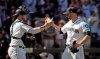 Seattle Mariners closing pitcher Marc Rzepczynski, right, and catcher Mike Zunino share congratulations after the team beat the Baltimore Orioles in a baseball game Wednesday, Aug. 16, 2017, in Seattle. The Toronto Blue Jays agreed to terms on a minor-league contract with left-handed pitcher Marc Rzepczynski on Monday. THE CANADIAN PRESS/AP, Elaine Thompson