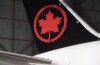 The tail of the newly revealed Air Canada Boeing 787-8 Dreamliner aircraft is seen at a hangar at the Toronto Pearson International Airport in Mississauga, Ont., Thursday, Feb. 9, 2017. THE CANADIAN PRESS/Mark Blinch