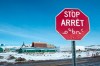 A stop sign in English, French and Inuit is seen in Iqaluit, Nunavut on April 25, 2015. The Inuit Circumpolar Council says if the novel coronavirus spreads to the north its communities in Canada, Alaska and Greenland are at a much higher risk of exposure because of a chronic lack of basic infrastructure and resources. The group says the Inuit must be considered in the government's national and regions response and preparedness plans for coronavirus and the potential compounding threat to basic health and well-being in those communities. THE CANADIAN PRESS/Paul Chiasson