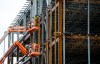 Steel workers build a structure in Ottawa on March 5, 2018. Canada is expected to cap 2019 with a stronger jobs report in December than the weak performance in the prior month. Economists on average expect the addition of about 25,000 jobs and the unemployment rate dipping to 5.8 per cent, according to financial markets data firm Refinitiv. THE CANADIAN PRESS/Sean Kilpatrick