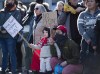 People stand on Wellington Street in Ottawa during a rally in solidarity with Wet'suwet'en hereditary chiefs opposed to the Costal GasLink Pipeline, on Monday, Feb. 24, 2020. A new poll suggests Canadians weren't happy with Justin Trudeau's handling of the natural-gas pipeline dispute in British Columbia that led to nationwide rail and road blockades mounted in solidarity with Indigenous leaders who oppose the project. THE CANADIAN PRESS/Justin Tang