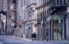 A couple walks along a deserted street in Old Montreal on Tuesday, March 31, 2020. As Canadians face the possibility of being alone with their significant other for the foreseeable future, some say marital discord is more likely than the kind of intimacy that would lead to a baby boom nine months from now. THE CANADIAN PRESS/Paul Chiasson