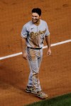 Pittsburgh Pirates' Adam Frazier smiles as he walks to the dugout during the third inning of the team's baseball game against the Chicago Cubs in Chicago, Saturday, Aug. 1, 2020. (AP Photo/Nam Y. Huh)