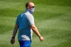 Chicago Cubs manager David Ross walks on the field during baseball practice at Wrigley Field on Friday, July 3, 2020 in Chicago. (AP Photo/Kamil Krzaczynski)