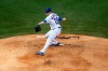 Chicago Cubs starting pitcher Kyle Hendricks (28) throws the ball during the first inning against the Milwaukee Brewers of an opening day baseball game, Friday, July, 24, 2020, in Chicago. (AP Photo/David Banks)