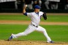 Chicago Cubs closer Craig Kimbrel throws the ball against the Pittsburgh Pirates during the ninth inning of a baseball game in Chicago, Friday, July 31, 2020. The Cubs won 6-3. (AP Photo/Nam Y. Huh)