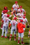 St. Louis Cardinals players celebrate after the Cardinals defeated the Chicago Cubs 7-3 in a baseball game in Chicago, Sunday, Sept. 6, 2020. (AP Photo/Nam Y. Huh)