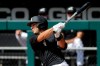 Chicago White Sox's Nick Madrigal hits a single during an intra-squad baseball game at Guaranteed Rate Field in Chicago, Tuesday, July 14, 2020. (AP Photo/Nam Y. Huh)
