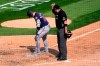 Minnesota Twins' Josh Donaldson kicks dirt on home plate after his home run prompting umpire Dan Bellino to eject him from the game during the sixth inning of a baseball game against the Chicago White Sox Thursday, Sept. 17, 2020, in Chicago. (AP Photo/Charles Rex Arbogast)