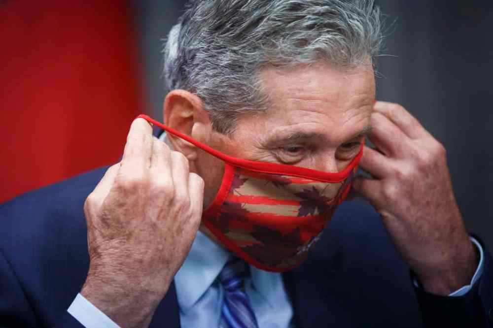 MIKE DEAL / WINNIPEG FREE PRESS
Premier Brian Pallister removes his mask before a press conference at the Manitoba Legislature. A recent study by MIT concludes masks are the most important protective measure when preventing transmission of COVID-19.