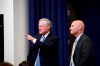 White House chief of staff Mark Meadows, left, and Vice President Mike Pence's chief of staff Marc Short speak before an event with President Donald Trump to sign executive orders on lowering drug prices, in the South Court Auditorium in the White House complex, Friday, July 24, 2020, in Washington. (AP Photo/Alex Brandon)