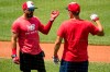 Washington Nationals' Adam Eaton (2), left, speaks with a staff member as the Washington Nationals hold their first training camp work out at Nationals Stadium, Friday, July 3, 2020, in Washington. (AP Photo/Andrew Harnik)