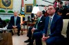 Former acting White House chief of staff Mick Mulvaney listens as President Donald Trump speaks during a meeting with Irish Prime Minister Leo Varadkar in the Oval Office of the White House, Thursday, March 12, 2020, in Washington. (AP Photo/Evan Vucci)