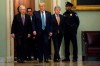 President Donald Trump walks with Senate Majority Leader Mitch McConnell of Ky., to a meeting with lawmakers on Capitol Hill, Tuesday, March 10, 2020, in Washington. (AP Photo/Evan Vucci)