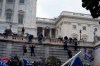 Supporters of President Donald Trump climb the West wall of the the U.S. Capitol on Wednesday, Jan. 6, 2021, in Washington. (AP Photo/Jose Luis Magana)