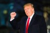 President Donald Trump gestures upon arrival at the White House, Wednesday, Jan. 22, 2020, in Washington, from the World Economic Forum in Davos, Switzerland, (AP Photo/Manuel Balce Ceneta)