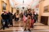 Supporters of President Donald Trump are confronted by Capitol Police officers outside the Senate Chamber inside the Capitol, Wednesday, Jan. 6, 2021 in Washington. (AP Photo/Manuel Balce Ceneta)