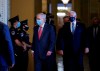 Senate Majority Leader Mitch McConnell, R-Ky., left, and Vice President Mike Pence, right, walk to hold a private meeting with Judge Amy Coney Barrett, President Donald Trump's nominee for the U.S. Supreme Court, at the Capitol in Washington, Tuesday, Sept. 29, 2020. (AP Photo/J. Scott Applewhite)