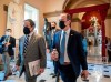 Impeachment manager Rep. Jamie Raskin, D-Md., left, and House Intelligence Committee Chairman Adam Schiff, D-Calif., right, walk to the House chamber for debate on the impeachment of President Donald Trump, at the Capitol in Washington, Wednesday, Jan. 13, 2021. The House of Representatives is pursuing an article of impeachment against Trump for his role in inciting an angry mob to storm the Capitol last week. (AP Photo/J. Scott Applewhite)