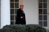 President Donald Trump walks along the colonnade of the White House in Washington, Monday, Jan. 13, 2020. Trump is heading to New Orleans, to attend the College Football Playoff National Championship between Louisiana State University and Clemson. (AP Photo/Susan Walsh)