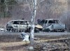 An RCMP investigator inspects vehicles destroyed by fire at the residence of Alanna Jenkins and Sean McLean, both corrections officers, in Wentworth Centre, N.S. on Monday, April 20, 2020. A retired high-ranking Mountie says the investigation into one of Canada's worst mass killings will tax the resources of Nova Scotia RCMP. THE CANADIAN PRESS/Andrew Vaughan