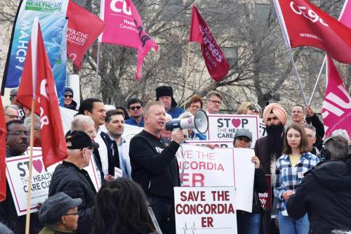 Supplied by Manitoba Federation of Labour
Manitoba Federation of Labour president Kevin Rebeck (with loudspeaker) says workers are still turning to unions to ensure they are treated fairly and with respect.