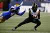 CP
Hamilton Tiger-Cats' Marcus Tucker (15) makes the catch as Winnipeg Blue Bombers' DeAundre Alford (45) defends during second half CFL action in Winnipeg Thursday, August 5, 2021. THE CANADIAN PRESS/John Woods