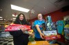 MIKAELA MACKENZIE / WINNIPEG FREE PRESS
Emma Fernando (left) and Amber Proutt show off some of the store's top picks at Red Bomb Fireworks.