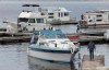 Boats get launched at Kawartha Lakes Marina in Bobcaygeon, Ont. on Saturday, May 16, 2020. THE CANADIAN PRESS/Fred Thornhill