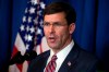 Secretary of Defense Mark Esper delivers a statement on Iraq and Syria, at President Donald Trump's Mar-a-Lago property, Sunday, Dec. 29, 2019, in Palm Beach, Fla. (AP Photo/ Evan Vucci)