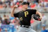 Pittsburgh Pirates' Mitch Keller (23) delivers a pitch during the first inning of a spring training baseball game against the Toronto Blue Jays Monday, March 2, 2020, in Dunedin, Fla. (AP Photo/Frank Franklin II)