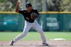 Pittsburgh Pirates' Ke'Bryan Hayes throws to second base during a spring training baseball workout Monday, Feb. 17, 2020, in Bradenton, Fla. (AP Photo/Frank Franklin II)