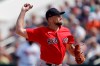 Boston Red Sox starting pitcher Nathan Eovaldi (17) works in the first inning of a spring training baseball game against the Minnesota Twins Monday, Feb. 24, 2020, in Fort Myers, Fla. (AP Photo/John Bazemore)