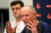 Ron Roenicke, right, speaks as Red Sox Chief Baseball Officer Chaim Bloom looks on after being after being named interim of the Boston Red Sox baseball team Tuesday, Feb. 11, 2020, in Fort Myers, Fla. at left. (AP Photo/John Bazemore)