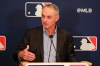 MLB Commissioner Rob Manfred answers questions at a press conference during MLB baseball owners meetings, Thursday, Feb. 6, 2020, in Orlando, Fla. (AP Photo/John Raoux)
