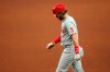 Philadelphia Phillies' Bryce Harper reacts after grounding out against the Tampa Bay Rays during the eighth inning of a baseball game Sunday, Sept. 27, 2020, in St. Petersburg, Fla. (AP Photo/Mike Carlson)