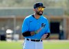Miami Marlins outfielder Matt Kemp (27) looks on during spring training baseball practice in Jupiter, Fla., Monday, Feb. 17, 2020. (David Santiago/Miami Herald via AP)