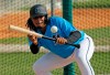 FILE - In this Feb. 12, 2020, file photo, Miami Marlins pitcher Sixto Sanchez run drills during spring training baseball practice in Jupiter, Fla. For a number of rebuilding teams, the 2020 baseball season was supposed to be another step in the progression of their top prospects eventually reaching the big leagues. With a truncated 60-game season in the majors and no minor league season expected, some clubs are concerned that the development of top prospects may be stunted. (David Santiago/Miami Herald via AP, File)